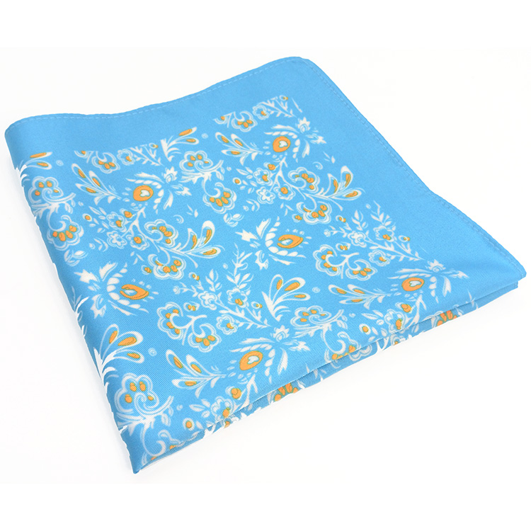 Lenço-azul-turquesa-com-padrão-branco-e-laranja-(3).jpg