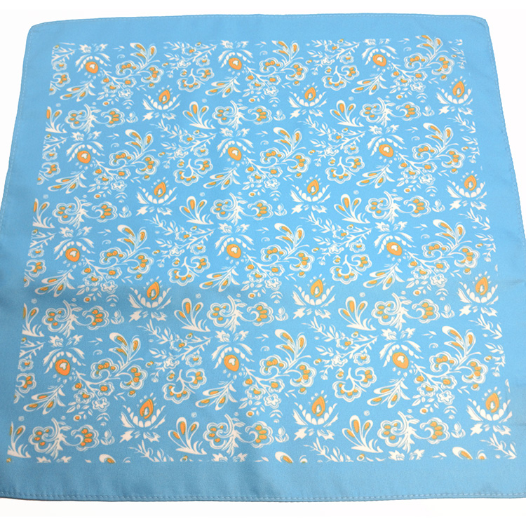 Lenço-azul-turquesa-com-padrão-branco-e-laranja-(4).jpg