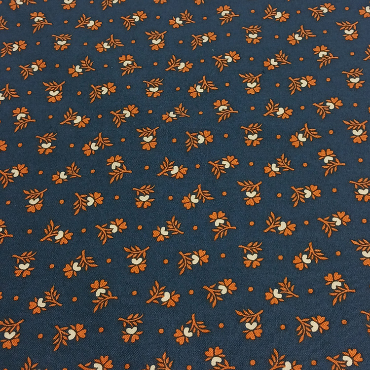 lenço-de-bolso-azul-marinho-com-flores-cor-ferrugem.jpg
